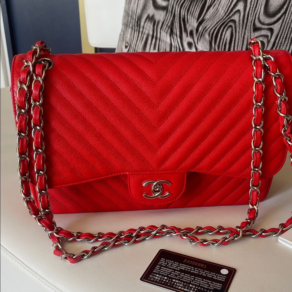 Chanel Red Chevron Leather Bag. Never used it excellent condition.